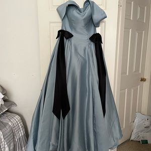 Blue Ball gown with black bows and detachable straps
Straps snap on and off